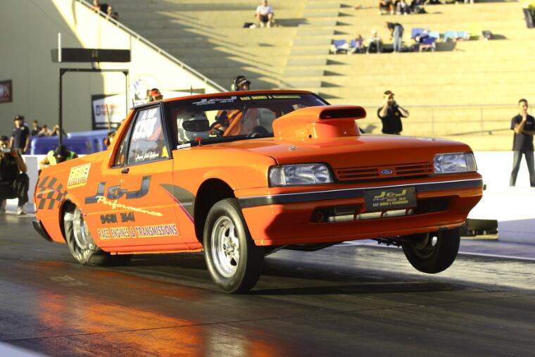Power Greg 1974 Ford XF ute drag car with its front wheels lifted