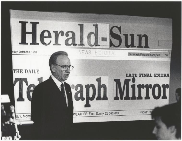 Rupert Murdoch announces newspaper mergers during a media conference inside the old Herald building, Flinders Street, Melbourne, 8 October 1990 
