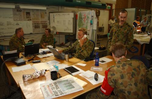 [Military officers at work, Curtin, Canberra, January 2003] [picture] / Damian McDonald