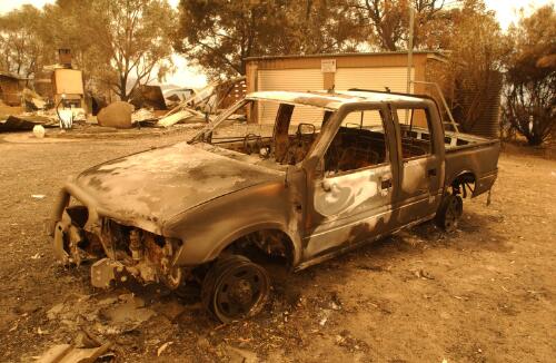 [Destroyed car at the Tidbinbilla Nature Reserve, Canberra, January 2003] [picture] / Damian McDonald