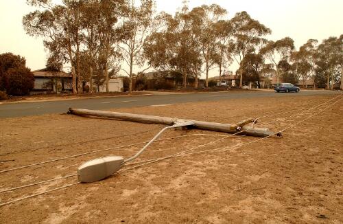 [Damaged street lights in Duffy, Canberra bushfires, 18 January 2003] [picture] / Damian McDonald
