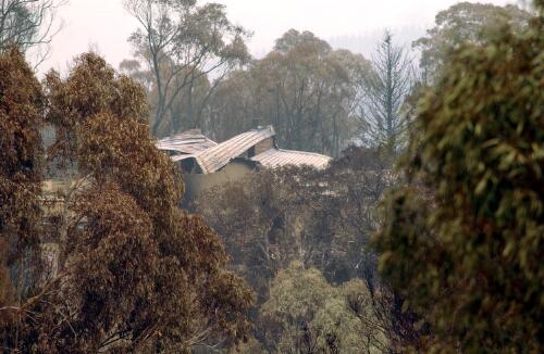 [Fire damaged house in Chapman, Canberra, January 2003, 2] [picture] / Loui Seselja
