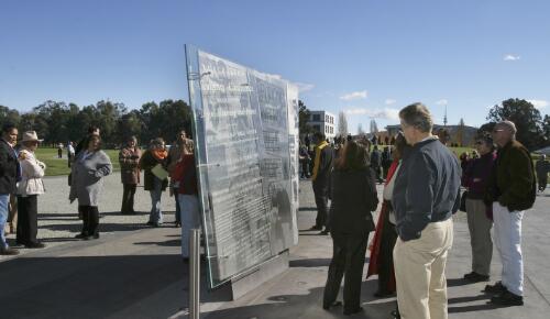 [People looking at the memorial, after the Reconciliation Place opening ceremony, Canberra, 28 May 2004, [2]] [picture] / Loui Seselja