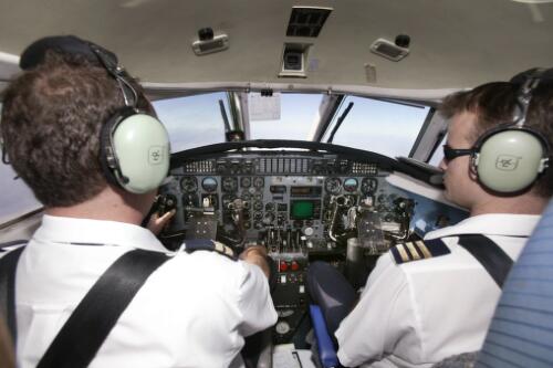 Captain Richard Godden and First Officer Troy Clegg in the cockpit of MacAir Airlines' Fairchild Metro VH-UUF Queensland, 31 May 2005 [picture] / Loui Seselja