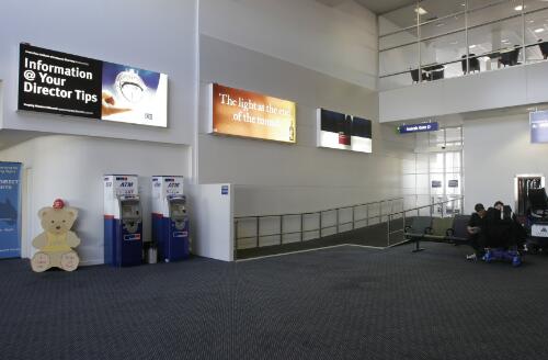 Automatic teller machines inside the Canberra Airport passenger terminal next to arrivals gate D, 8 June 2005 [picture] / Loui Seselja