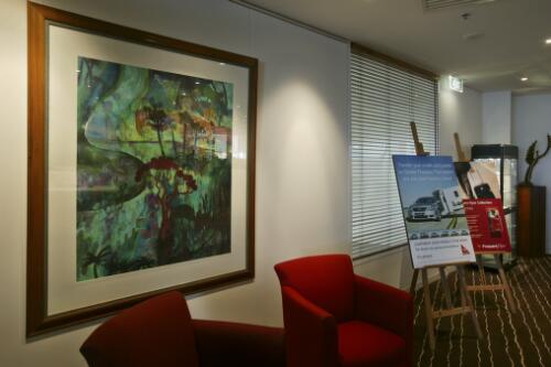 Artwork and advertisements on display inside the Qantas Club Lounge, Canberra Airport, 8 June 2005 [picture] / Loui Seselja