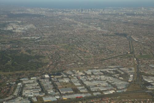 Aerial view of Melbourne taken from Virgin Blue's Boeing 737-800 "Virginia Blue", VH-VUA, 21 June 2005 [1] [picture] / Damian McDonald
