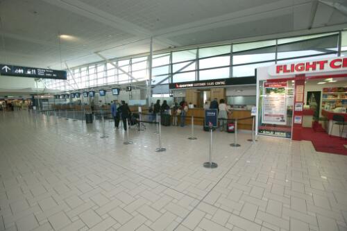 Departure check-in counters, Brisbane International Airport, 1 July 2005 [picture] / Greg Power