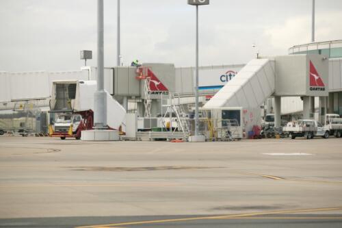 Airport apron with Qantas gates in the background, Brisbane International Airport, 1 July 2005 [picture] / Greg Power