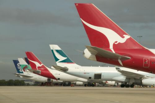 Tails of Qantas, Cathay Pacific, Air Niugini, Singapore Airlines and Air New Zealand aeroplanes, international terminal, Brisbane Airport, 1 July 2005 [picture] / Greg Power