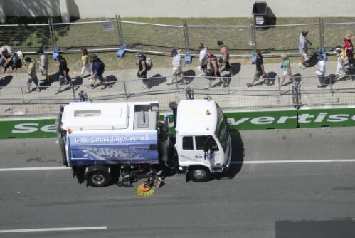 Sweeper truck clearing the track of rubber and debris at the Lexmark Indy 300, Gold Coast, Queensland, October 2005 [picture] / Greg Power