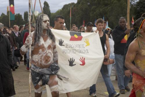 Aboriginal representatives carrying a banner with the words Erambie Remembers at the Apology to the Stolen Generations of Australia, Canberra, 13 February 2008 [picture] / Damian McDonald