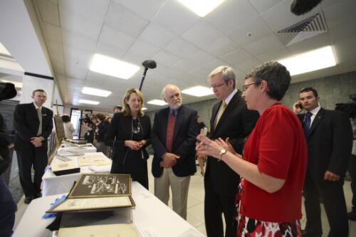 Jasmine Cameron, David Day, Prime Minister Kevin Rudd and Marie-Louise Ayres, viewing items from the National Library of Australia's collection, during the book launch of Andrew Fisher's biography at the National Library of Australia, Canberra, 29 October 2008 [picture] / Loui Seselja