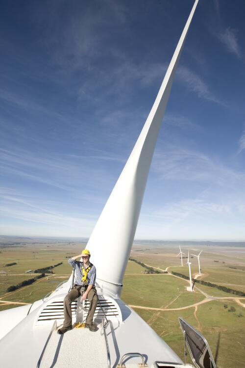 Stuart Daley, site manager of Capital Wind Farm, sitting on top of wind turbine 22, Bungendore, New South Wales, 2010 / Sam Cooper
