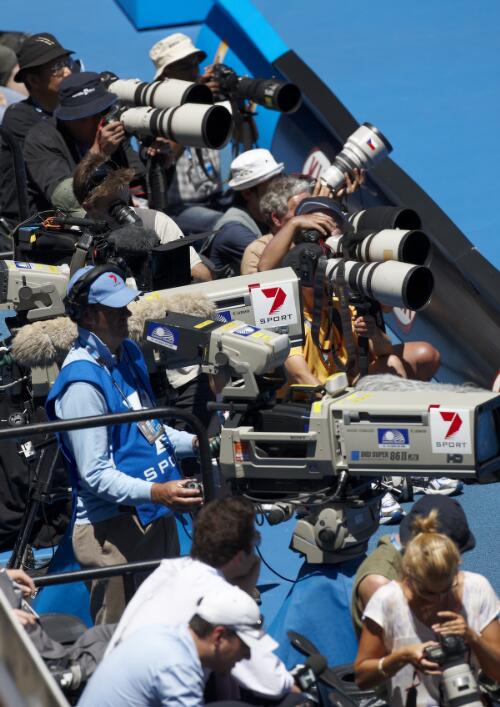 Photographers and television cameramen capturing a tennis game at the Rod Laver Arena during the Australian Open tennis tournament, Melbourne, 20 January 2011 [picture] / Greg Power