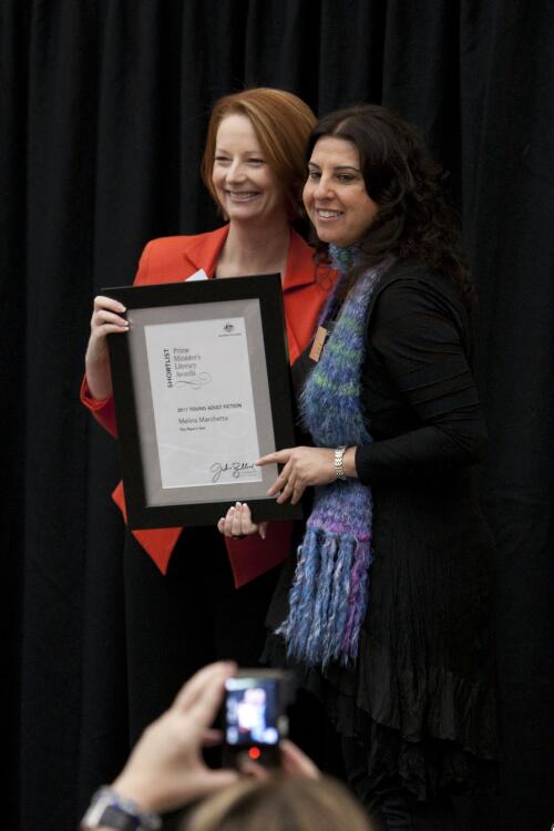 Prime Minister Julia Gillard presenting novelist Melina Marchetta with her award at the Prime Minister's Literary Awards held at the National Library of Australia, Canberra, 8 July 2011 [picture] / Craig Mackenzie