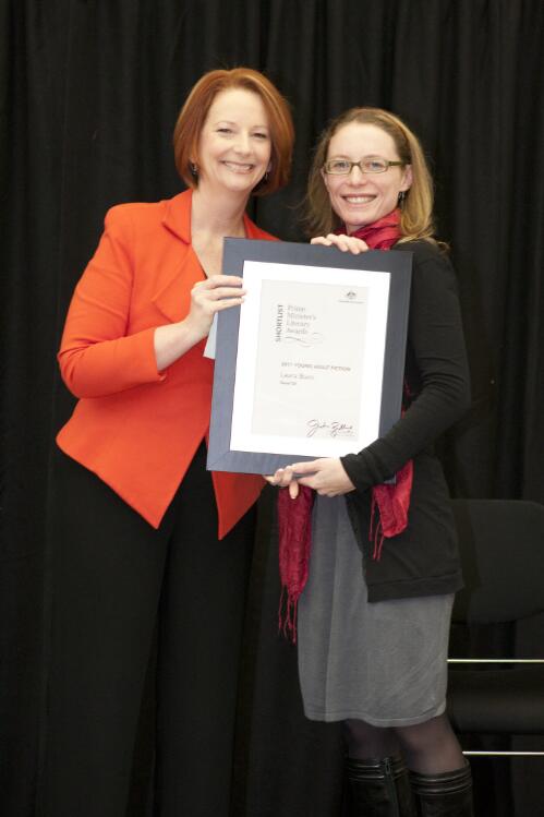 Prime Minister Julia Gillard presenting novelist Laura Buzo with her award at the Prime Minister's Literary Awards held at the National Library of Australia, Canberra, 8 July 2011 [picture] / Sam Cooper