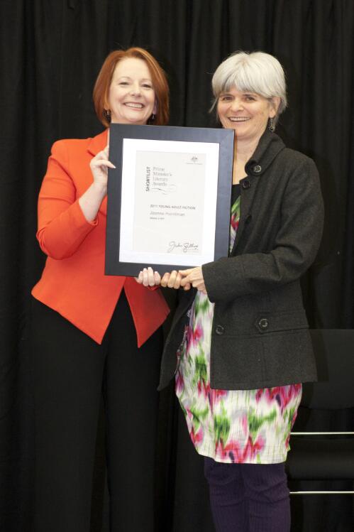 Prime Minister Julia Gillard presenting novelist Joanne Horniman with her award at the Prime Minister's Literary Awards held at the National Library of Australia, Canberra, 8 July 2011 [picture] / Sam Cooper