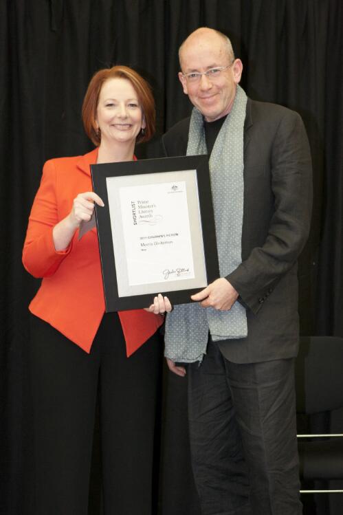 Prime Minister Julia Gillard presenting novelists Morris Gleitzman with his award at the Prime Minister's Literary Awards held at the National Library of Australia, Canberra, 8 July 2011 [picture] / Sam Cooper