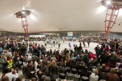 The crowd gathering around the track for the Victorian Roller Derby League versus the Texas Rollergirls team Hotrod Honeys bout, Melbourne Showgrounds, Melbourne 23 July 2011 [picture] / Samuel Cooper