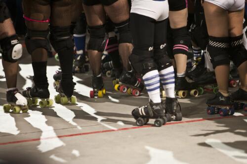 A view of the skates worn by the roller derby skaters as both teams gather at the end of the Victorian Roller Derby League All-Stars versus the Texas Rollergirls Hotrod Honeys bout, Melbourne Showgrounds, Melbourne 23 July 2011 [picture] / Samuel Cooper