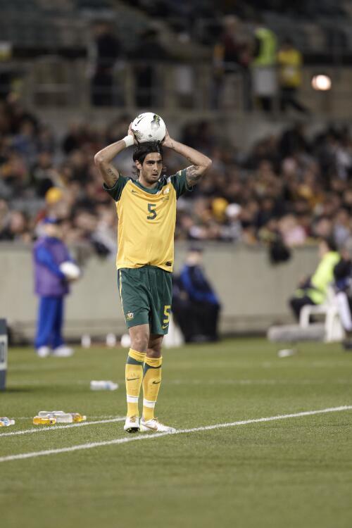 Rhys Williams throwing in, Socceroos Australia v Malaysia soccer match, Canberra Stadium, Canberra, 7 October 2011 [picture] / Greg Power