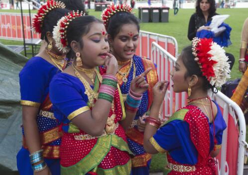 Group of girls checking their makeup before their dance performance at Boishakhi Mela, Bengali New Year, Sydney Olympic Park, Sydney, 20 April 2013 / Lannon Harley