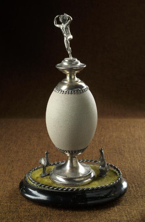 [Emu egg on silver-plate and wood stand] [realia]
