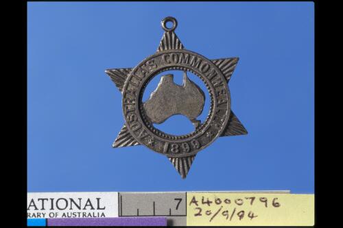 [Badge inscribed: Australia's Commonwealth, 1899] [realia]