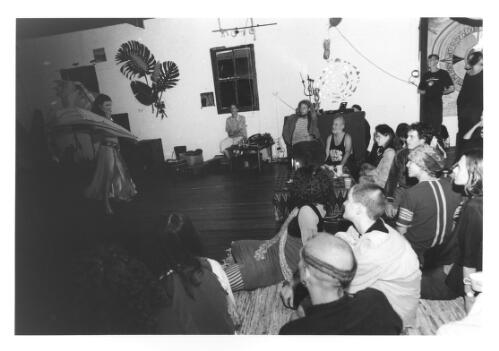 Belly dancer (Amber) & audience, at Playspace, King St, Lismore, Sunday 22 May 1999 [picture] / Suzon Fuks