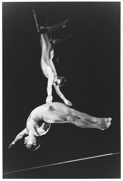 Double trapeze: Stephen Champion and Jane Mullet, Circus Oz, Sydney, August 1982 [picture] / Regis Lansac
