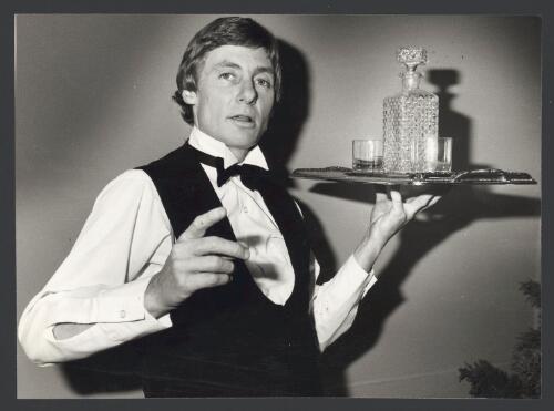 [Portrait of John Bannon carrying a drinks tray] [picture]