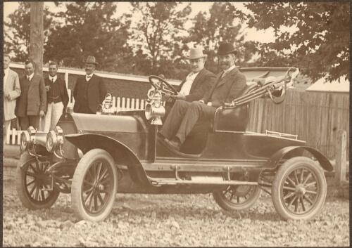 Alfred Deakin and Dr Walter E. Harris [?] sitting in an automobile, Armidale [?] New South Wales, ca. 1911 [picture]