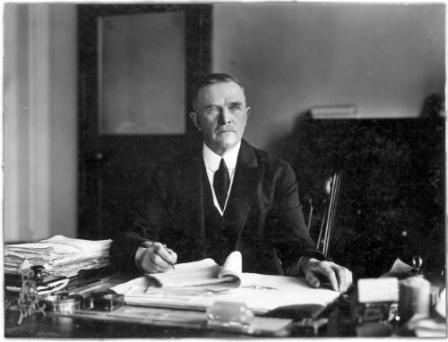[Portrait of William Gerrand Gibson seated at his desk] [picture]