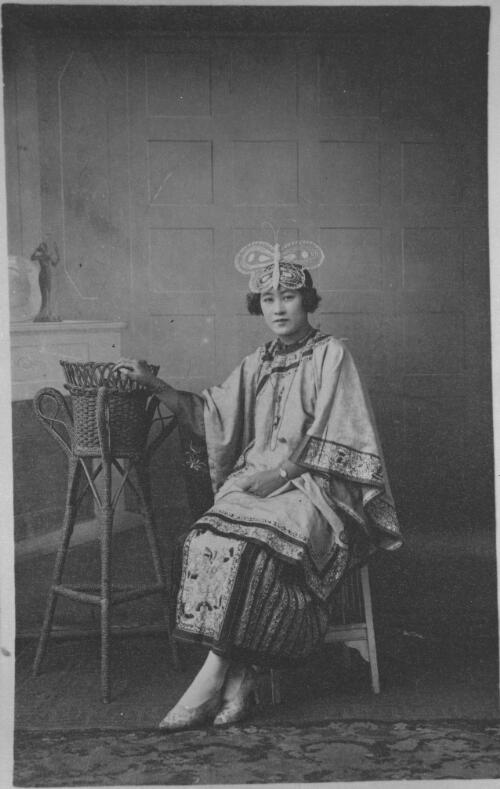 Portrait of Nell Nomchong, an early Braidwood settler, wearing her mother Boo Jung Gew's (Mary Nomchong) 1887 wedding dress, Braidwood, New South Wales, approximately 1910? [picture]