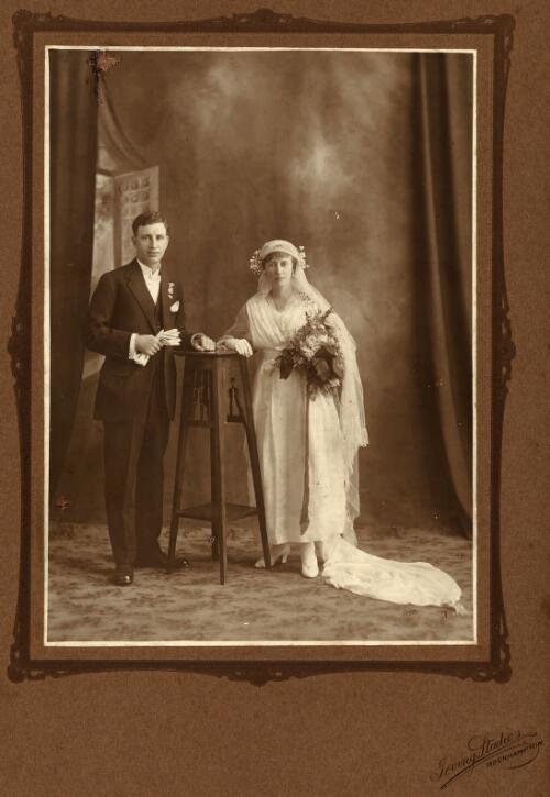 Portrait of Joseph Richard Foster and Agnes Maud Jaggard on their wedding day at St. Pauls, Rockhampton, 1919 [picture] / Irving Studios, Rockhampton
