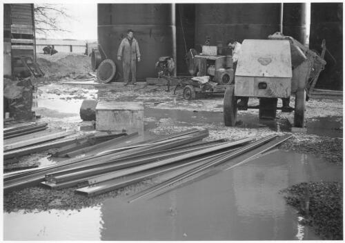 Construction workers building steelwork for six 12,000 gallon tanks, Ballarat, Victoria, June 1956 [picture]