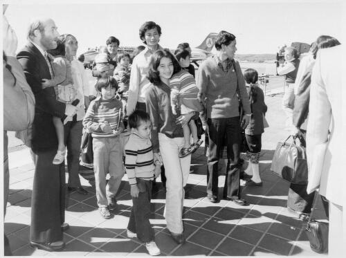 A group of Indo-Chinese refugees arrives in the national capital, Canberra, 1979 [picture] / Australian Information Service photograph by John Crowther