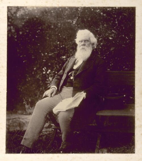 [Portrait of Sir Henry Parkes sitting on garden bench, ca. 1890] [picture]