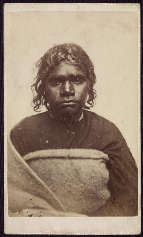 Portrait of unidentified Aboriginal woman wrapped in blanket, between 1860 and 1879 [picture]