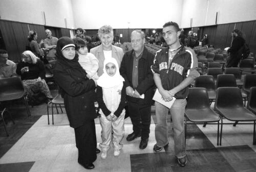 Maha Habib with her children, Beverly and Terry Hicks, and Ahmend Habib at a rally for David Hicks and Mamdouh Habib at the Sydney Trades Hall, 20 September, 2003 [picture] / Paul Cosgrave