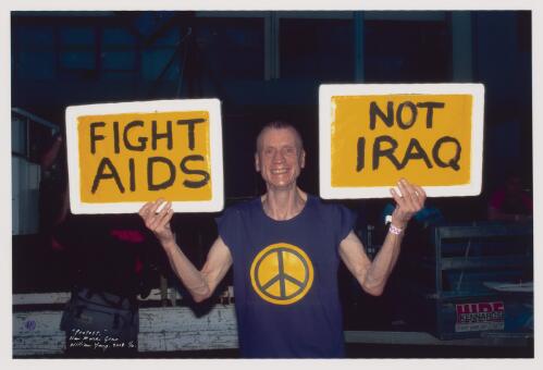 Protest, [fight AIDS not Iraq], New Mardi Gras, 2003 [picture] / William Yang