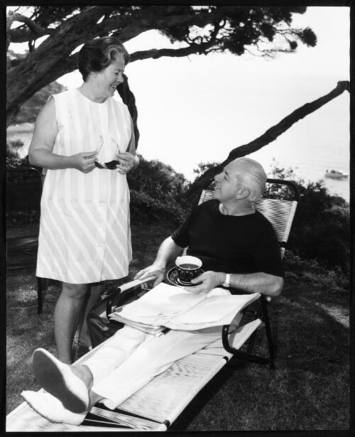 [Harold Holt seated on a banana lounge while talking with Dame Zara Holt, Portsea, Victoria, 1966] [picture]