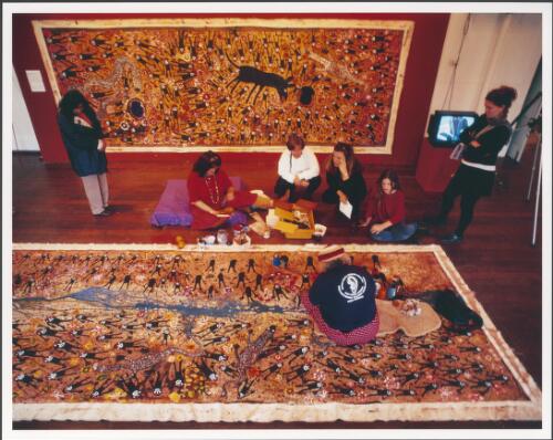 Mary Mclean seated and working on Everybody is coming in for water, Fremantle Arts Centre, Fremantle, Western Australia, 1995 [picture] / Richard Woldendorp