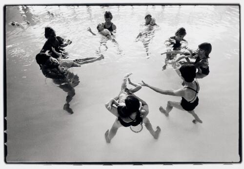 Volunteers work in groups with children in the hydrotherapy pool at the Sir David Brand Centre, Perth, February 1989 [picture] / Roger Garwood