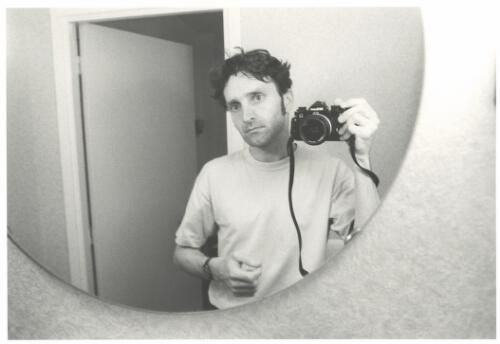 Self portrait of photographer Philip Gostelow, taken in a hotel room, Groningen, Netherlands, 1999 [picture] / Philip Gostelow