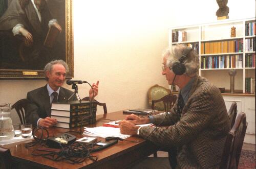 Lord Robert May, President of the Royal Society of London (left) in interview for the Oral History Archives of the National Library of Australia with Dr. Peter Pockley, in the President's office and beneath portrait of former President, Sir Isaac Newton, 24 March 2003 [picture] / Peter Pockley