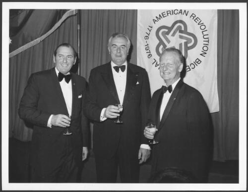 Mr [Edward Gough] Whitlam (centre) with the United States ambassador to Australia, Mr Marshall Green (right) and the president of the Australian-American Association, Mr Allan G. Moyes (left) at an Independence Day dinner in Sydney on July 4 1975 [picture] / Australian Information Service photograph by John Tanner