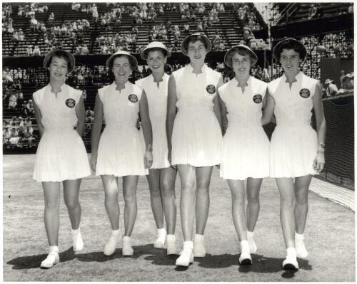 Six of the Australian usherettes at White City during the 1954 Davis Cup draw, Australia versus America [picture] / Ern McQuillan