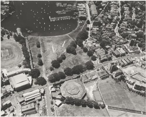 Aerial view of  Sydney Stadium at Rushcutters Bay, 1968, the stadium situated bottom middle, circular building [picture] / Ern McQuillan
